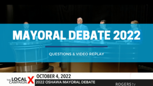 Blog header image of still from televised mayoral debate; moderator Peter Bocking, current mayor Dan Carter, candidate Joe Ingino, candidate Sara Lear overlaid with blog title Oshawa Mayoral Debate 2022 - Questions & Video Replay