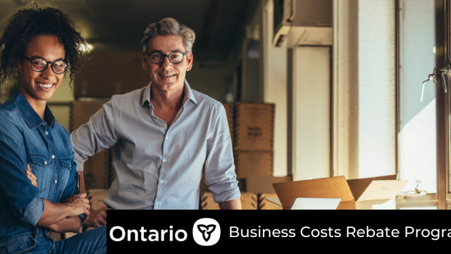 Stock photo of business owners with article title text Eligibility & Application For Ontario Business Costs Rebate Program
