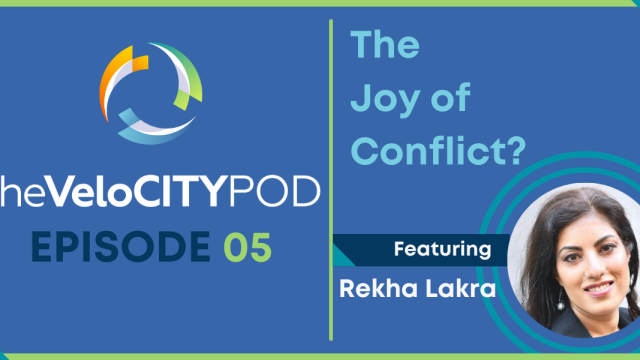 Header image with a photo of lawyer, mediator, speaker, and author, Rekha Lakra, episode title The Joy of Conflict